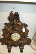 A large spelter mantel clock.