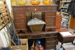 Two mahogany pedestal desks.