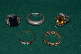A group of decorative rings.