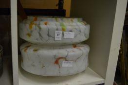 Two glass ceiling shades.