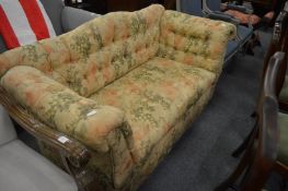 A Victorian button upholstered double drop-end settee.