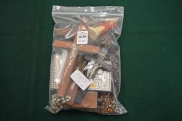 A group of crucifixes, rosary beads etc.
