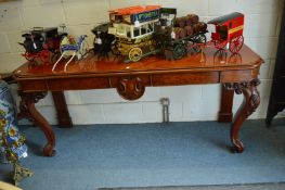 A good 19th century mahogany serving table with two frieze drawers on carved cabriole front legs,