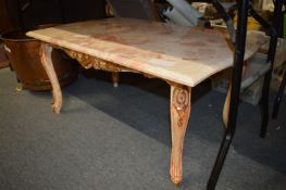 A marble top coffee table.