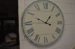 A large modern wall clock.