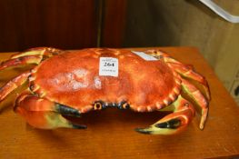 A cast iron box and cover modelled as a crab.