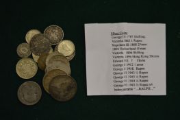 A group of silver coins.