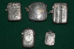 A group of silver vesta cases.