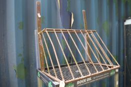 A wrought iron hay manger.