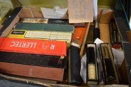 A collection of Otis King calculators with instructions and other slide rules.