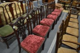 A set of six Chippendale style mahogany dining chairs.
