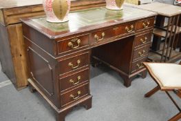 Reproduction mahogany desk.