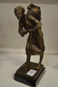 Bronze figure of an Arab water vendor.