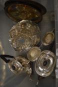 A plated four piece tea and coffee service, pierced pedestal cake stands and three salvers.