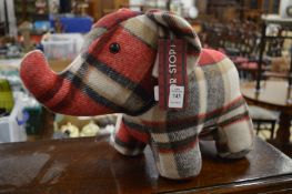 A door stop modelled as an elephant.