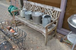A hardwood garden bench.