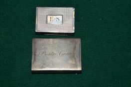 Two silver matchbox holders.