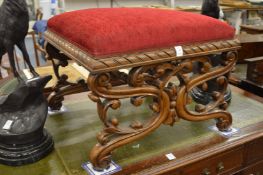 A good carved walnut and upholstered square shaped stool.