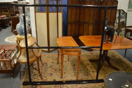 A Japanese black lacquer kimono stand.