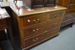 A mahogany chest of drawers.