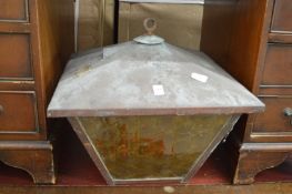 A large copper hanging lantern.