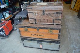 Three old storage trunks.