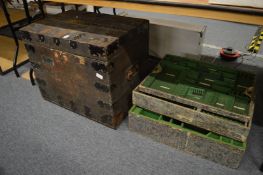 A metal bound silver chest with fitted interior.