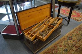 A good pine carpenters chest containing numerous tools.