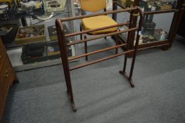 A mahogany towel rail.