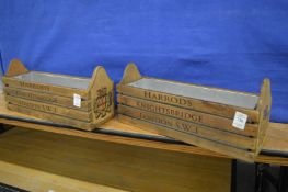 A pair of novelty herb planters.