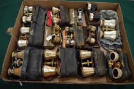 A good collection of cased mother of pearl opera glasses.