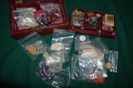 A leather jewellery case with contents.