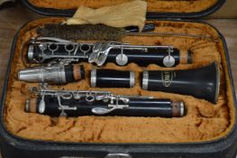 A cased clarinet.