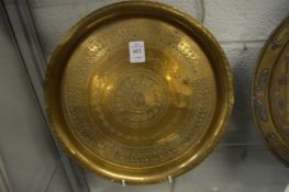 Three Cairo ware and Islamic brass trays.