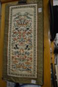 A Chinese silk work picture, mounted but unframed.