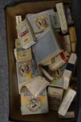 A quantity of early cigarette boxes.