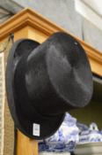 A silk top hat, internal measurements 8