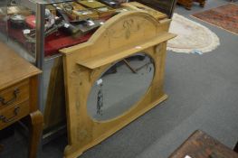 A 19th century pine over-mantel mirror.