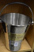 A Laurent-Perrier champagne bucket.