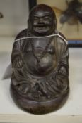 Model of a seated Buddha.