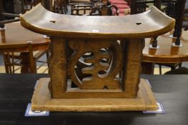 An Ashanti carved wood stool.