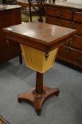 A Victorian rosewood work table.