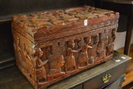 A Benin carved wood coffer.