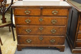 A good 18th century style pollard oak bachelors chest with folding rectangular top above two frieze