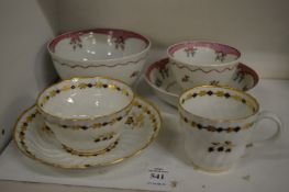 A 19th century Worcester porcelain trio and Newhall tea bowl and saucer and larger bowl.