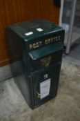 A cast iron post box.