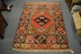 An unusual Persian part silk rug with geometric decoration, 160cm x 120cm.