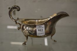 A good heavy silver sauce boat.