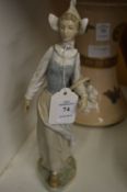 A Lladro figure.