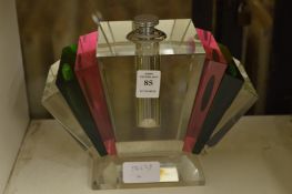 A glass scent bottle.